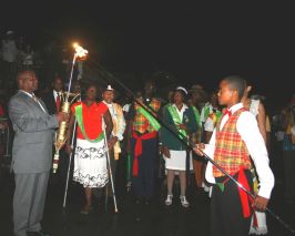 kalingo_child_prepares_to_light_reunion_torch.jpg