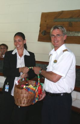 keira_aird_presents_gift_to_legend_of_the_seas_captain.jpg