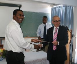 canadian_high_commissioner_hands_over_cheque_march_2008.jpg