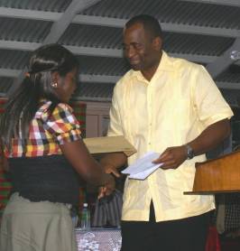 pm_skerrit_presents_cheque_to_tete_morne_village_council_may_2009.jpg