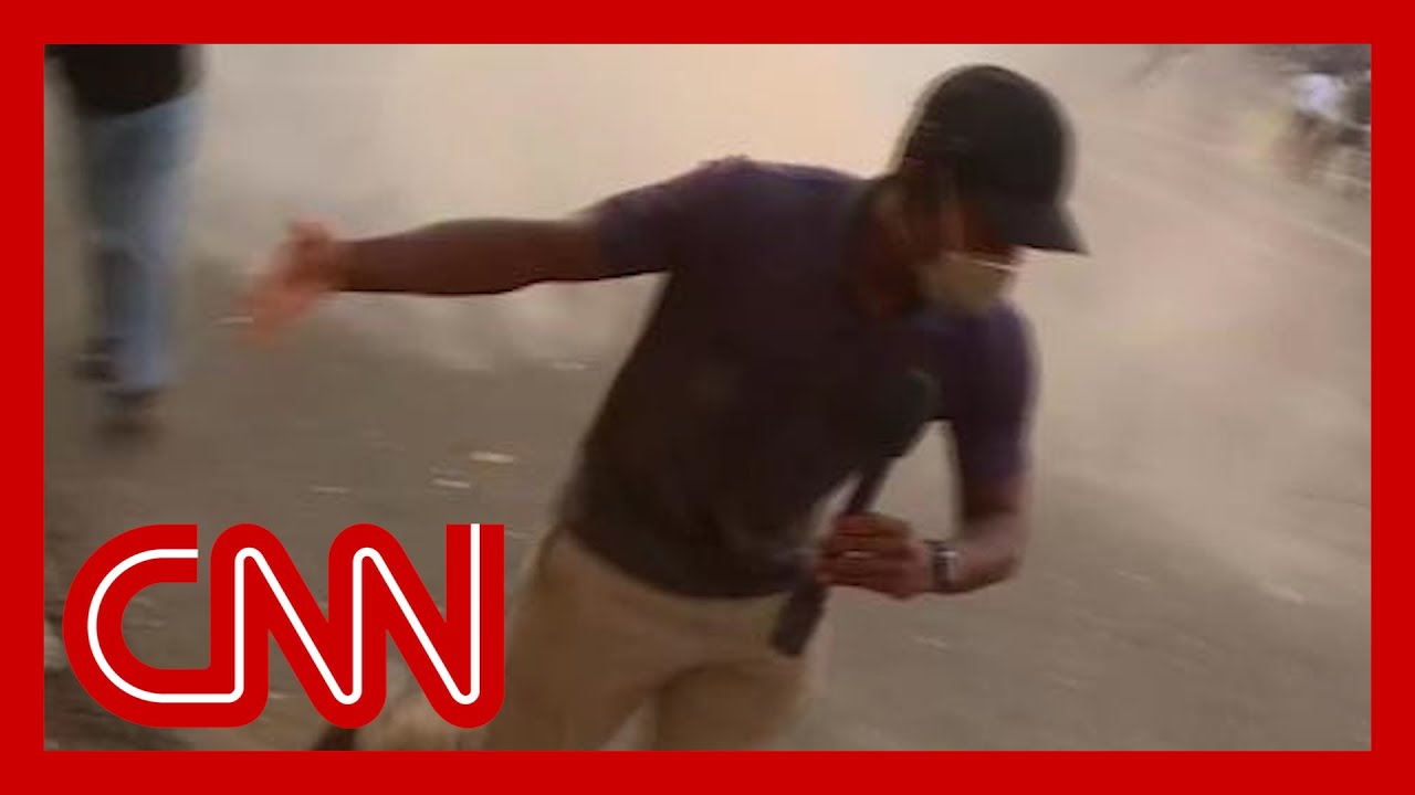 Escalating protests force CNN crew to flee to safety 1
