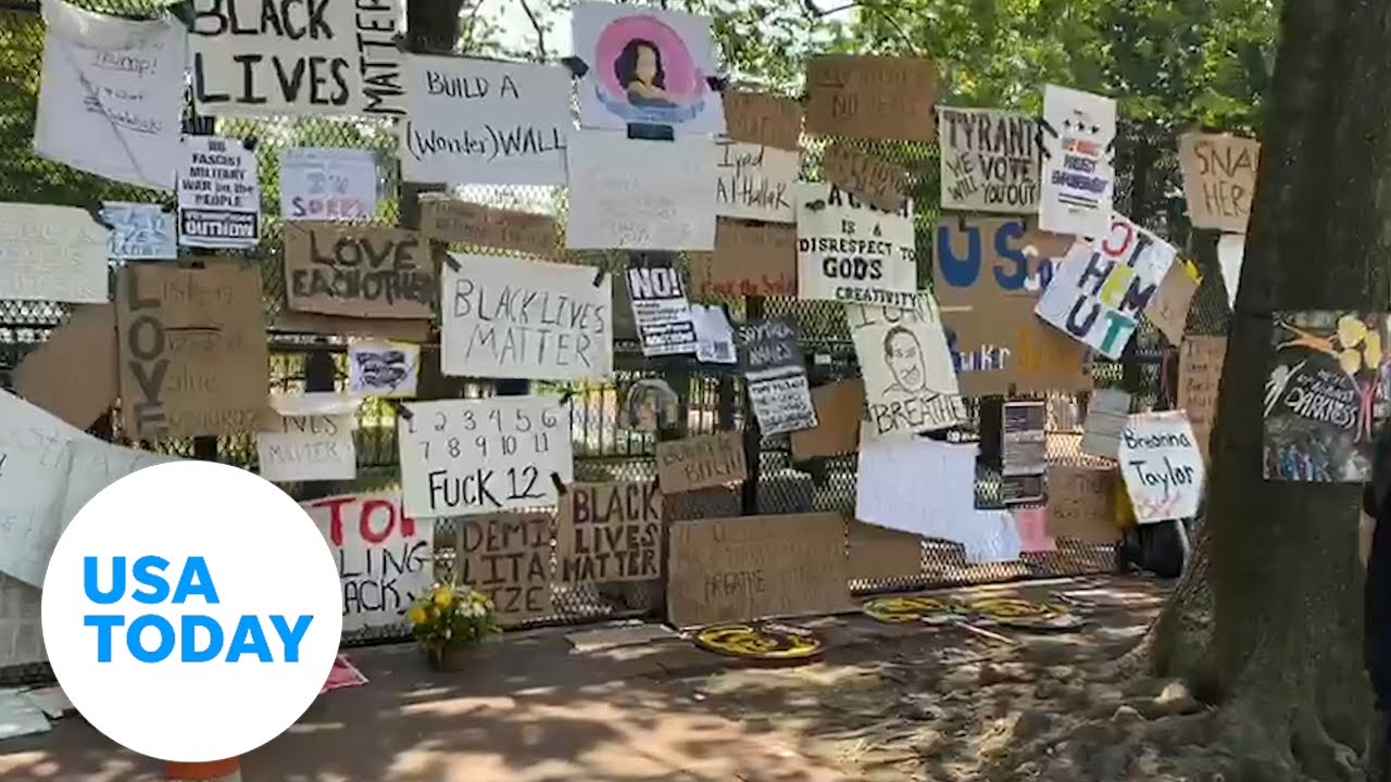 White House fence covered with 'BLM' posters | USA TODAY 1