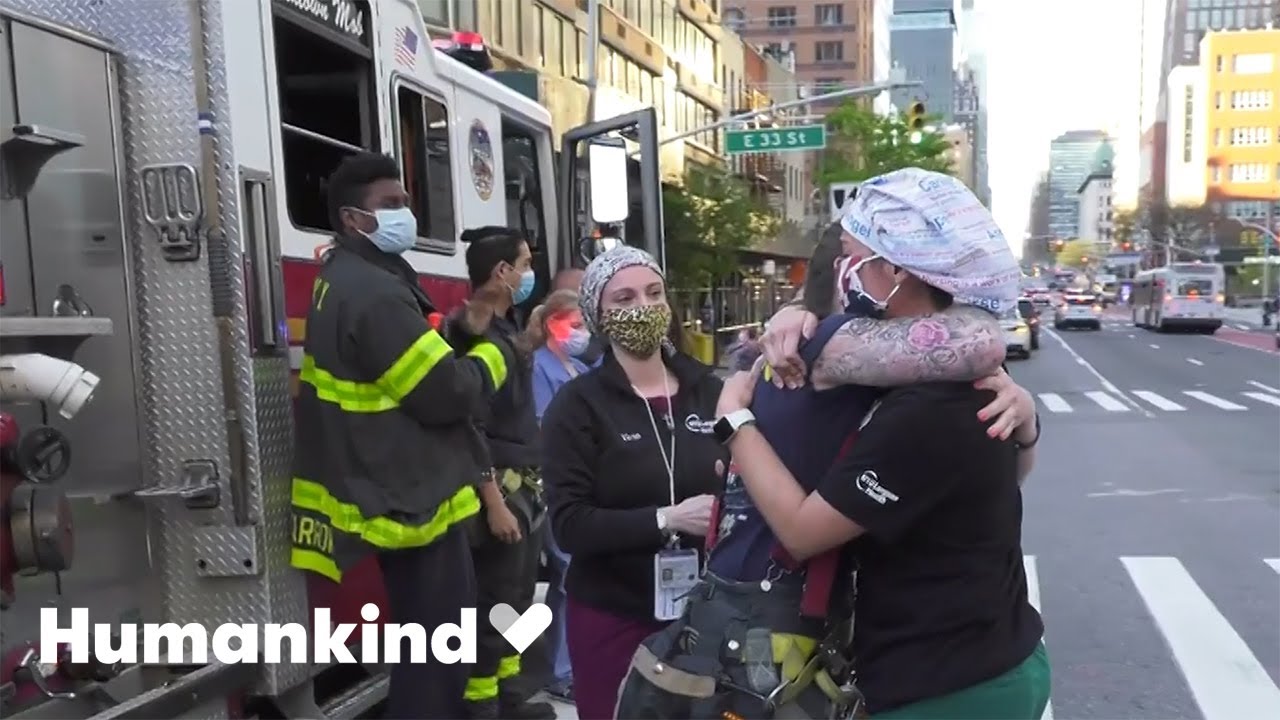 Nurse and firefighter share emotional embrace | Humankind 1