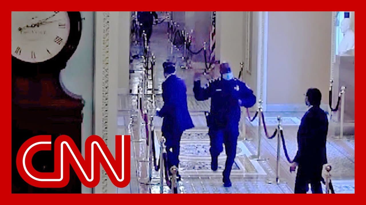 Jake Tapper reacts to video of officer rushing Mitt Romney to safety 1
