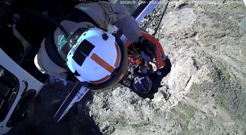 Caught on cam: Chopper crew rescues man clinging to cliff 1