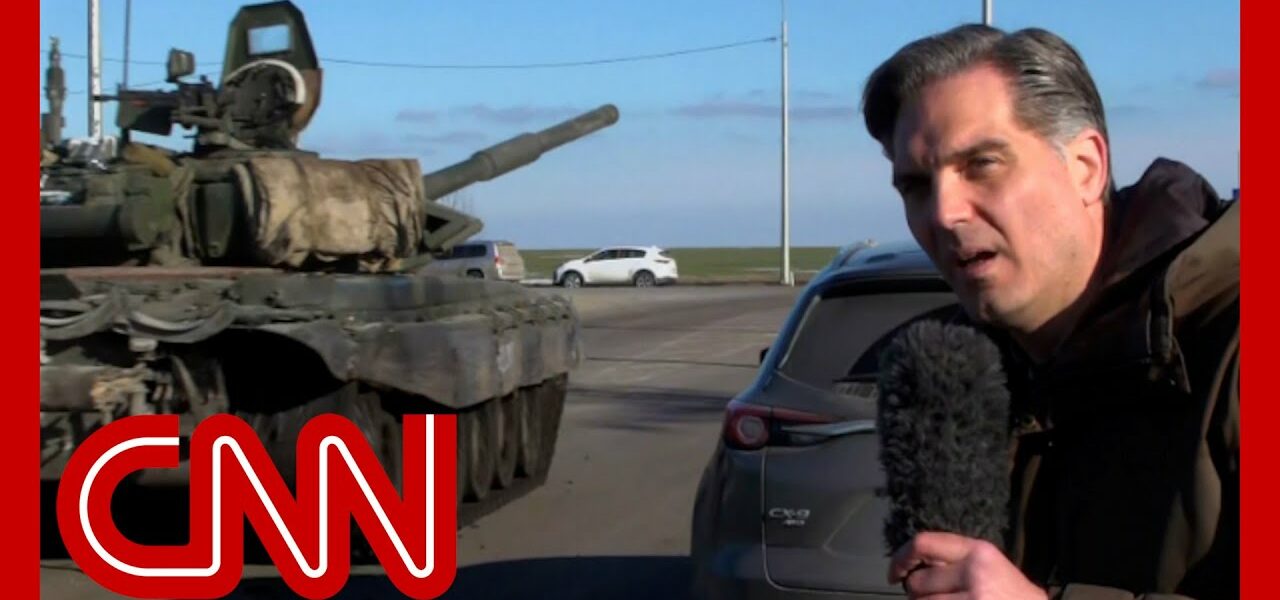 Russian tanks roll past CNN reporter as they appear to head towards Ukraine 1