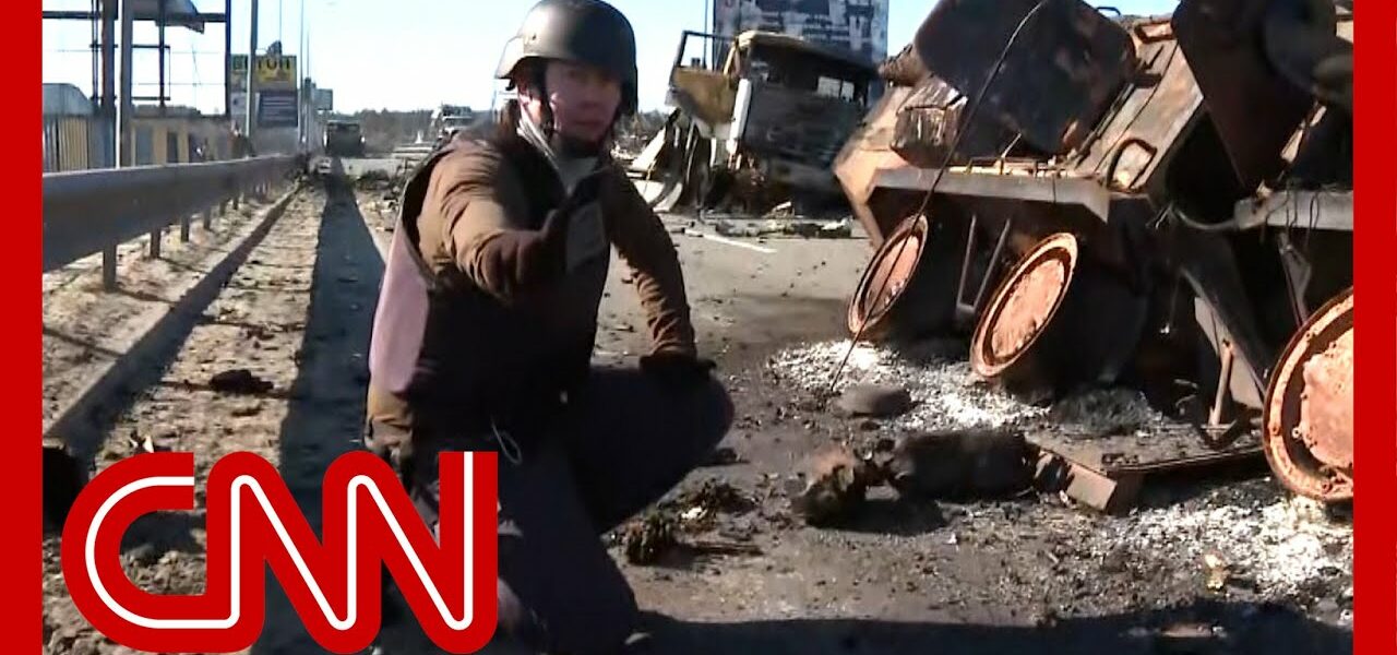 CNN reporter discovers he is crouching by grenade while on air 1