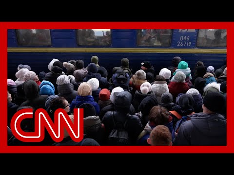 Families flee Zaporizhzhia, Ukraine, on packed trains after Russians seize nuclear power station 1