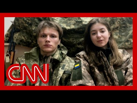 Ukrainian newlyweds take up arms together to defend their country 1