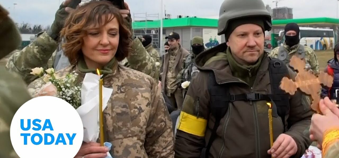 Ukrainian military couple reunites, marries while fighting invasion | USA TODAY 1
