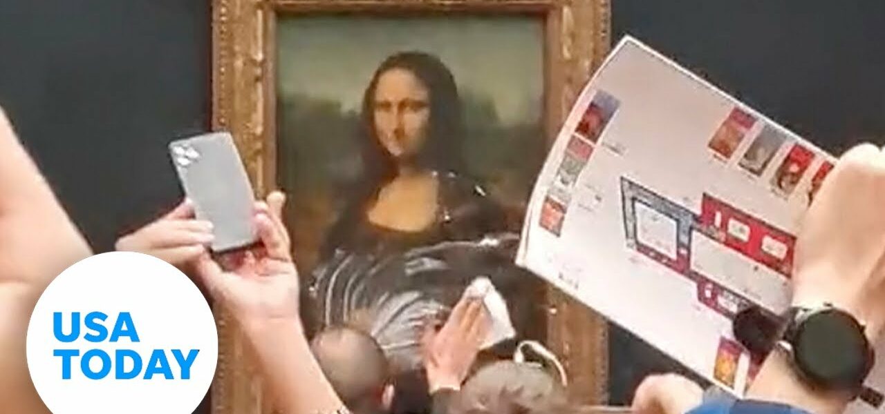 Man throws cake at Mona Lisa painting at Louvre Museum in Paris | USA TODAY 1