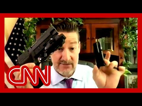Lawmaker pulls out weapons on webcam: 'I can do whatever I want with my guns' 1