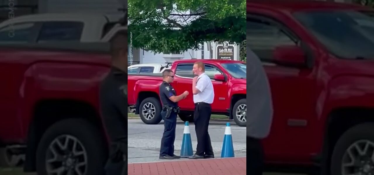 Police officer helps young man while directing traffic | USA TODAY #Shorts 3