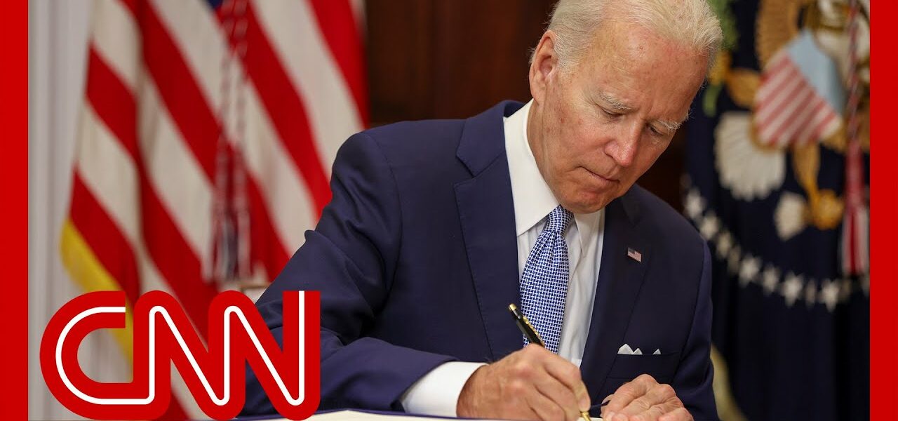 Biden signs bipartisan gun safety bill into law 1