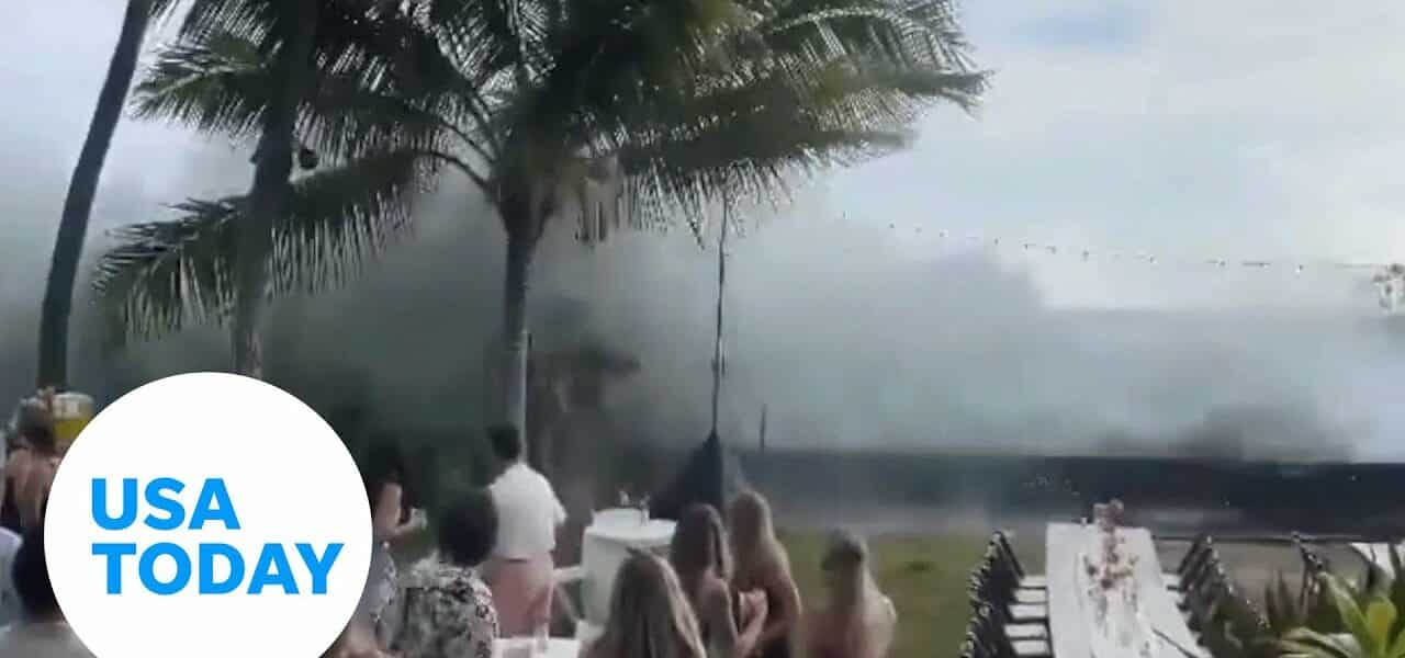 Giant waves in Hawaii crash the party during wedding reception | USA TODAY 1