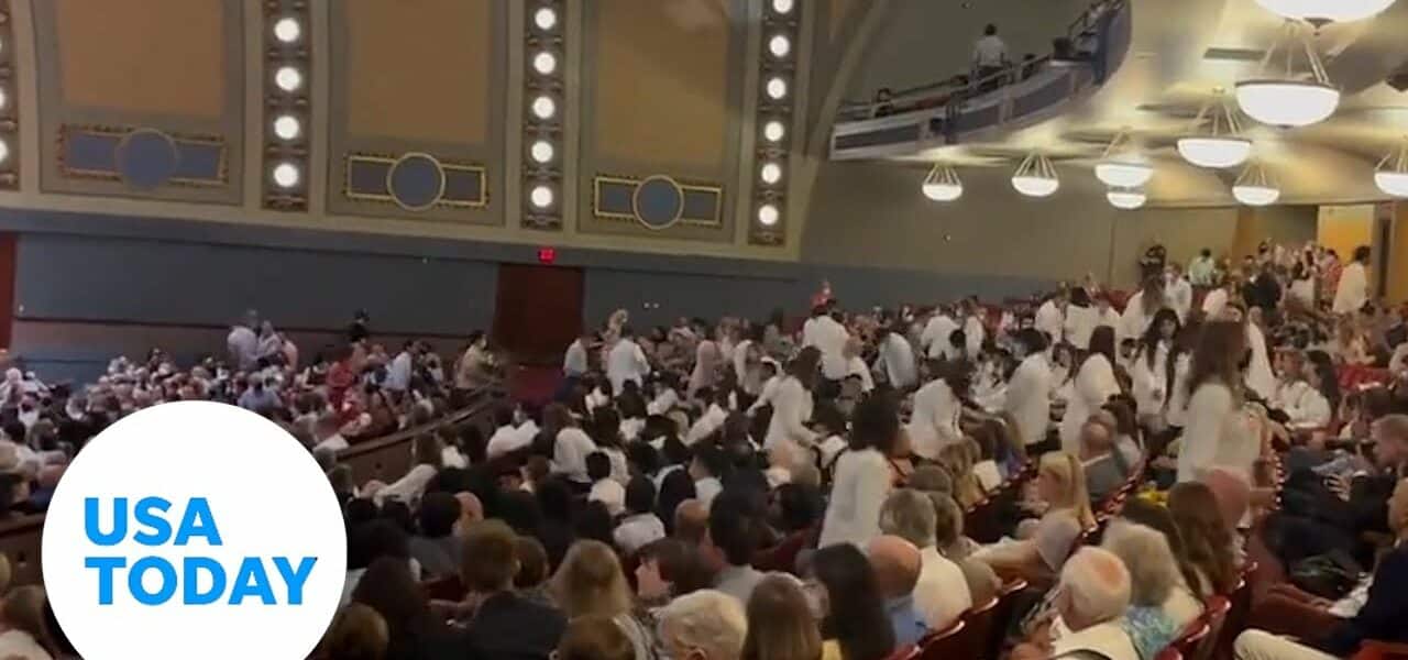Medical students walk out of ceremony in protest of speaker | USA TODAY 1