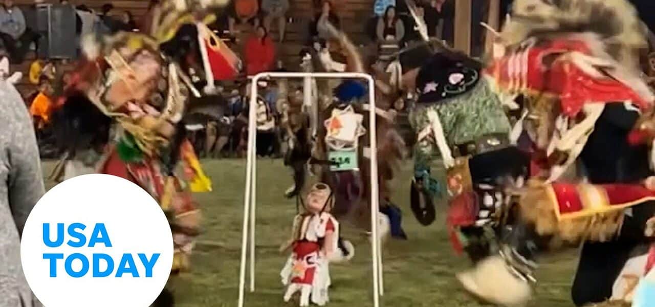 Baby jumps around as elders dance during First Nations powwow | USA TODAY 2