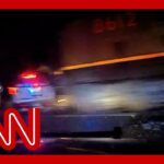 Train hits police vehicle with suspect inside 4