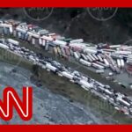 Drone video shows massive traffic jam as Russians flee the country 9