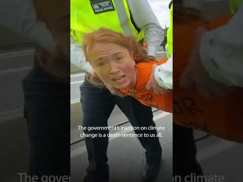 Climate protester gives impassioned speech while carried by police | USA TODAY #Shorts 1